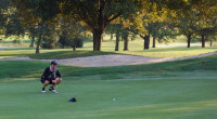 Harry lines up a putt